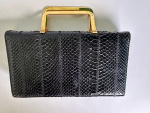 Vintage snakeskin leather clutch bag with gold handle