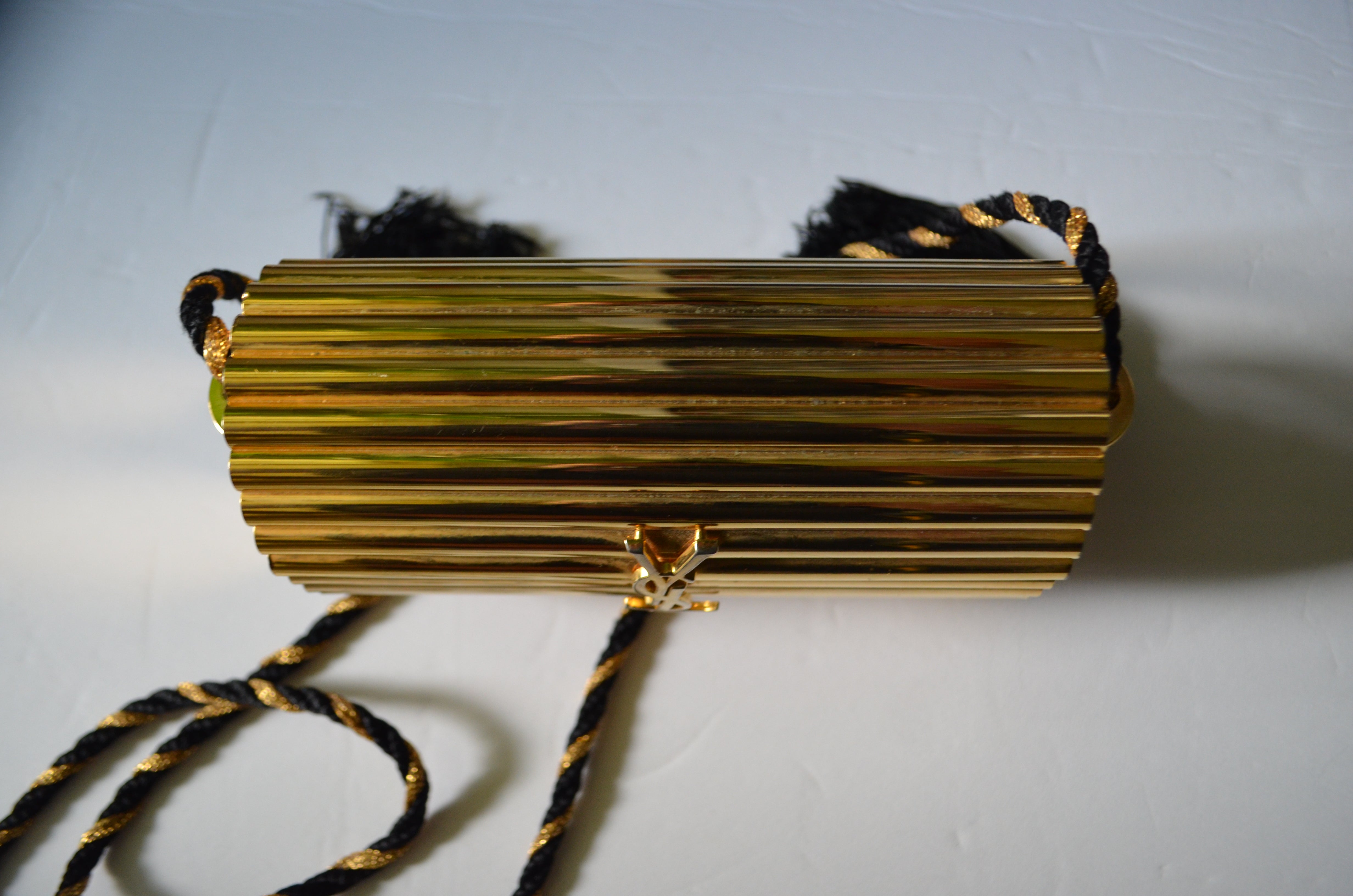 Yves Saint Laurent Gold Metal Minaudiere Tassel Clutch - Handbag | Pre-owned & Certified | used Second Hand | Unisex