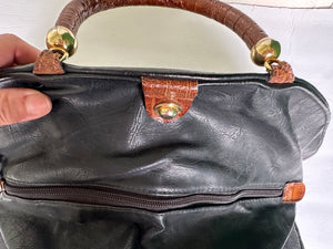 80s Extravagant bag in black and brown leather by the Italian brand Roda Style