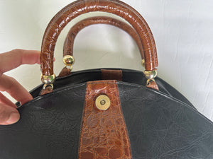 80s Extravagant bag in black and brown leather by the Italian brand Roda Style