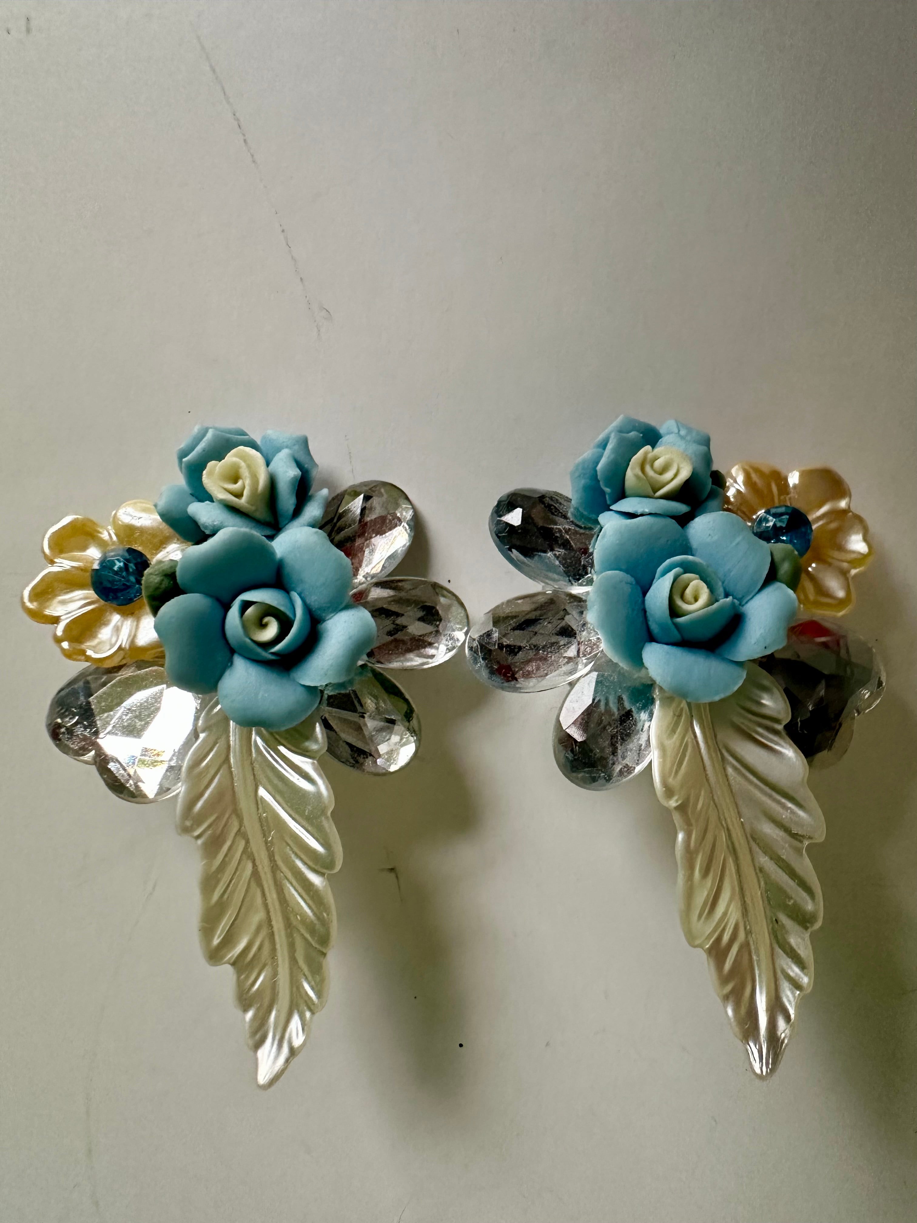 Vintage Blue Plastic Flower Clip On Earrings Crystal Textured Wings Leaves