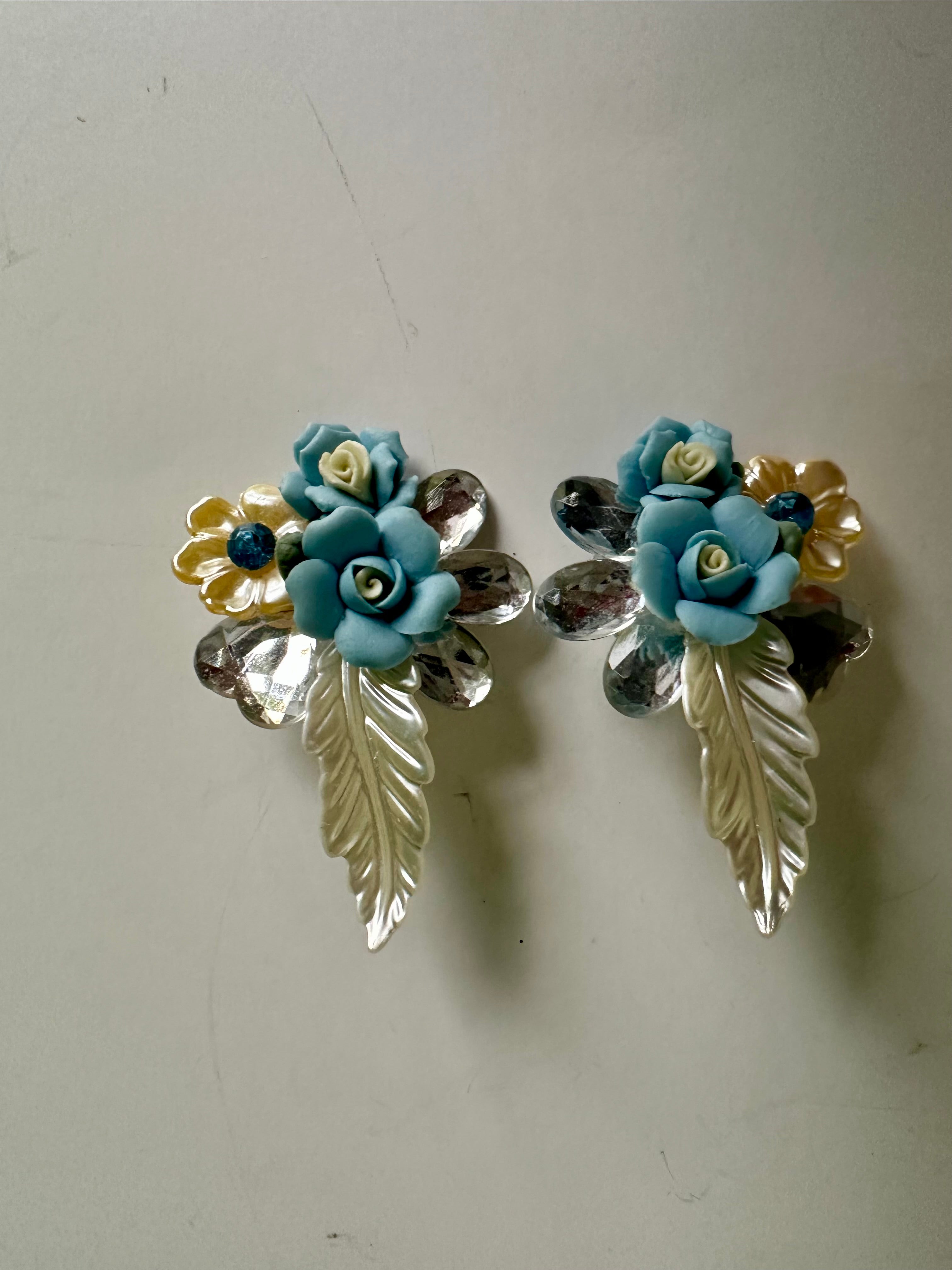 Vintage Blue Plastic Flower Clip On Earrings Crystal Textured Wings Leaves