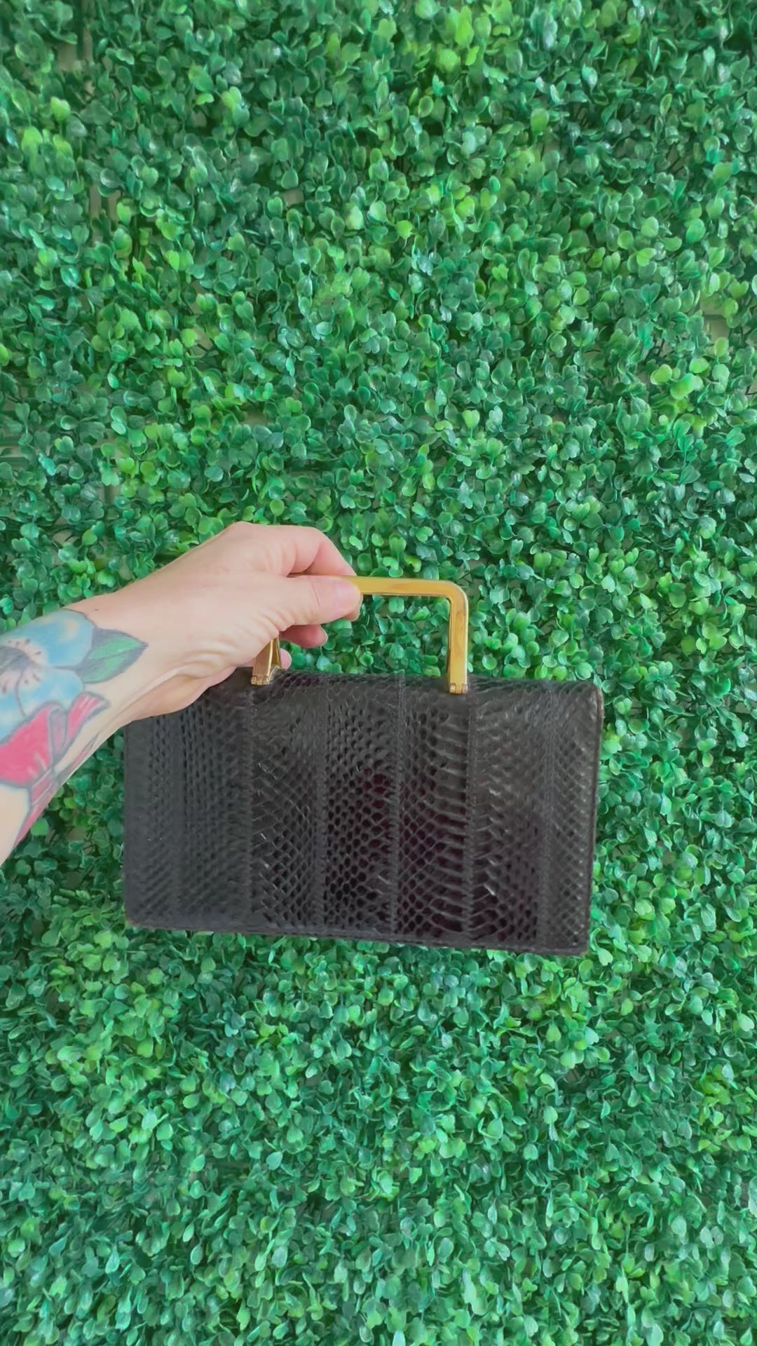 Vintage snakeskin leather clutch bag with gold handle