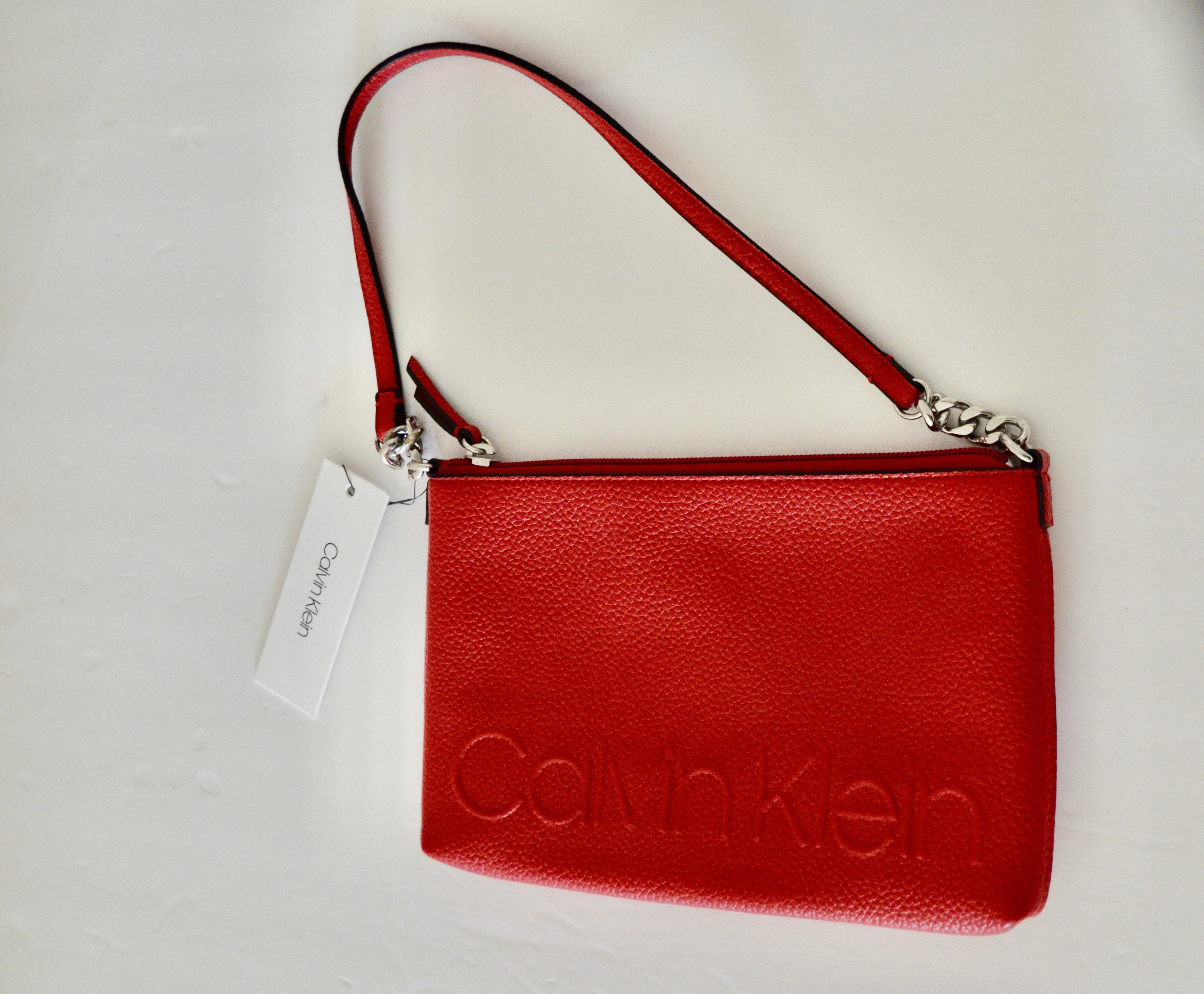 Buy the Calvin Klein Red Signature Faux Leather Shoulder Bag | GoodwillFinds